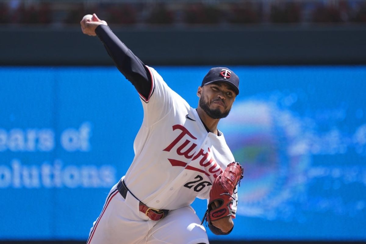 Aug 19, 2026; Minneapolis, Minnesota, USA; Minnesota Twins starting pitcher Taj Bradley (26) throws to the Atlanta Braves in the first inning at Target Field. Mandatory Credit: Bruce Kluckhohn-Imagn Images