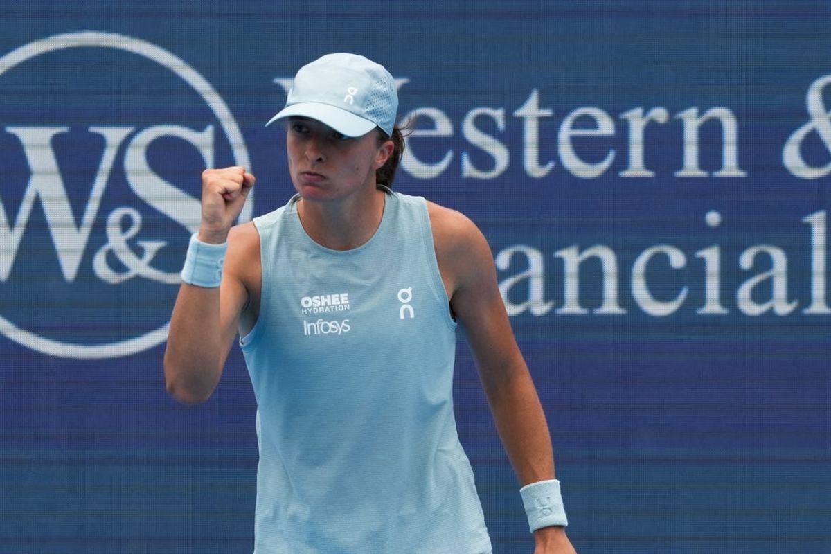 Aug 19, 2026; Mason, OH, USA;  Iga Swiatek (POL) reacts after returning a shot against Diane Parry (FRA) during the Cincinnati Open at Lindner Family Tennis Center. Mandatory Credit: Aaron Doster-Imagn Images