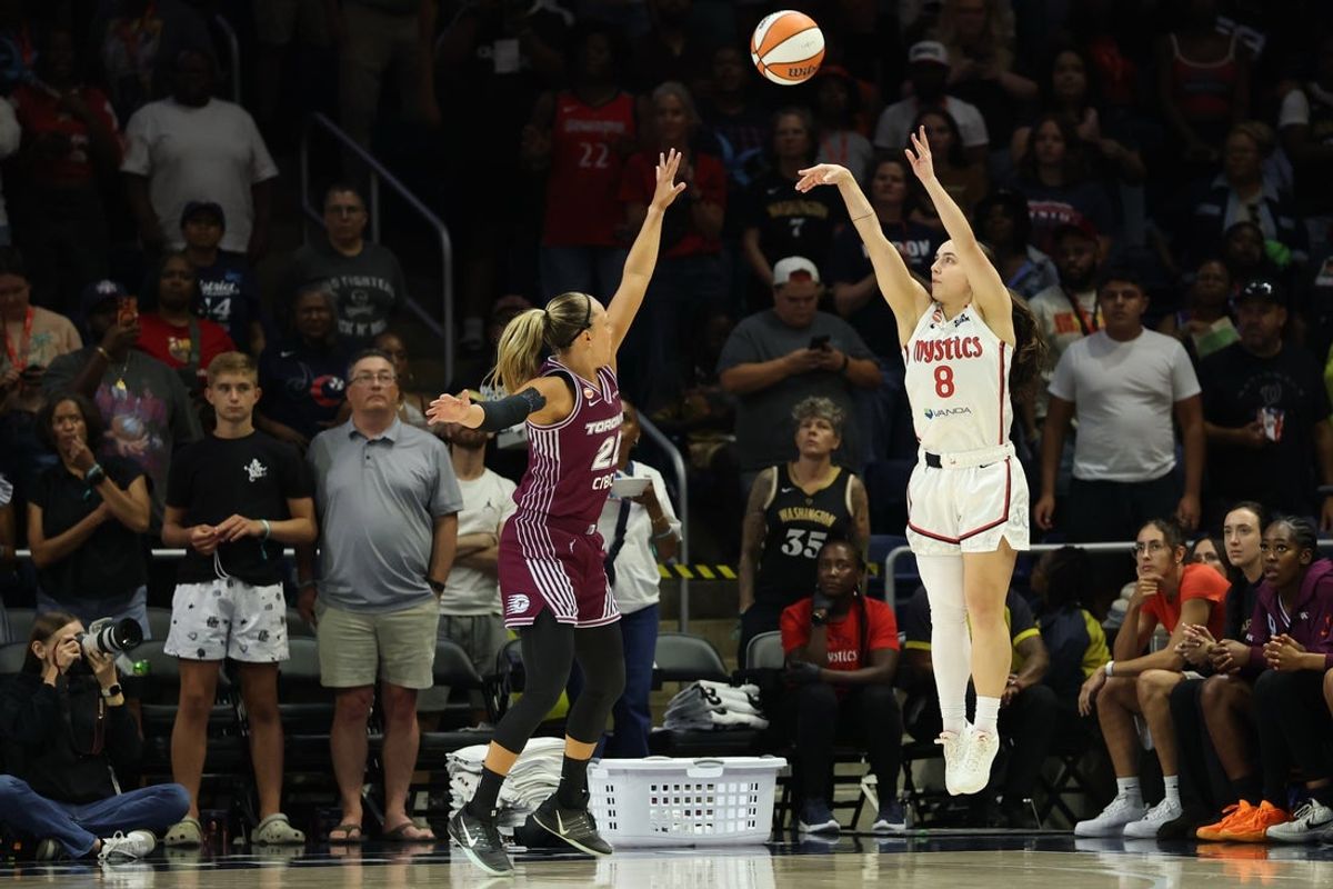 Aug 19, 2026; Washington, District of Columbia, USA; Washington Mystics guard Georgia Amoore (8) shoots the ball as Toronto Tempo guard Julie Allemand (22) defends in the first half at CareFirst Arena. Mandatory Credit: Geoff Burke-Imagn Images