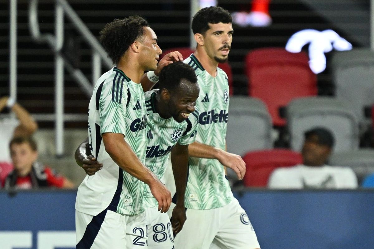 Aug 19, 2026; Washington, District of Columbia, USA;  New England Revolution midfielder Alhassan Yusuf (80) celebrates with teammates after scoring his second goal in the first half against DC United at Audi Field. Mandatory Credit: Jamie Sabau-Imagn Images