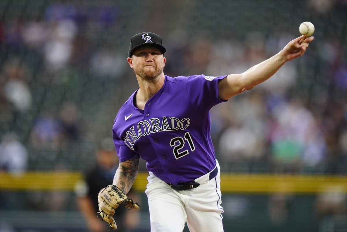 Aug 19, 2026; Denver, Colorado, USA; Colorado Rockies starting pitcher Kyle Freeland (21) delivers a pitch in the first inning against the Los Angeles Dodgers at Coors Field. Mandatory Credit: Ron Chenoy-Imagn Images