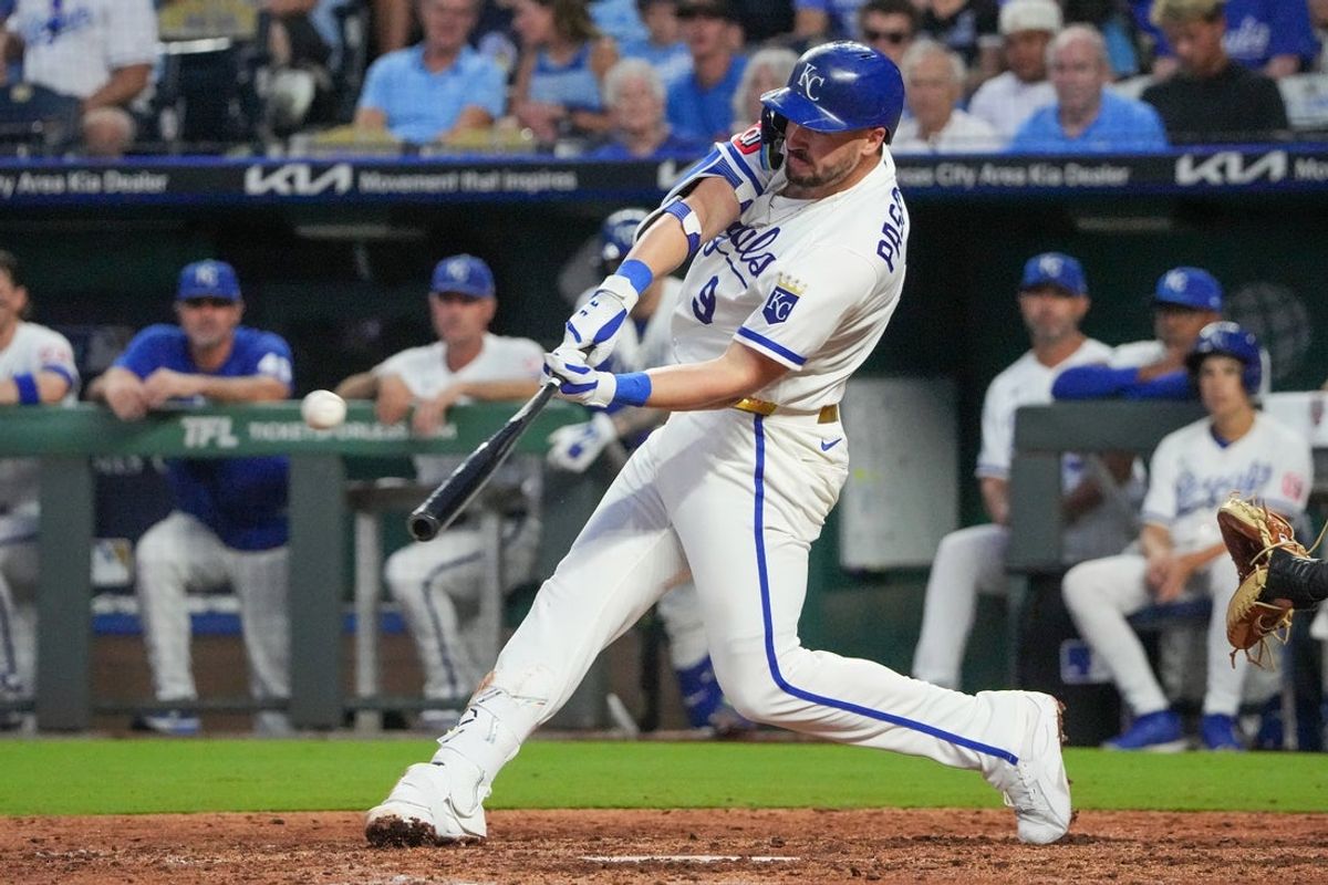 Aug 19, 2026; Kansas City, Missouri, USA; Kansas City Royals first baseman Vinnie Pasquantino (9) hits a solo home run against the Athletics during the sixth inning at Kauffman Stadium. Mandatory Credit: Denny Medley-Imagn Images