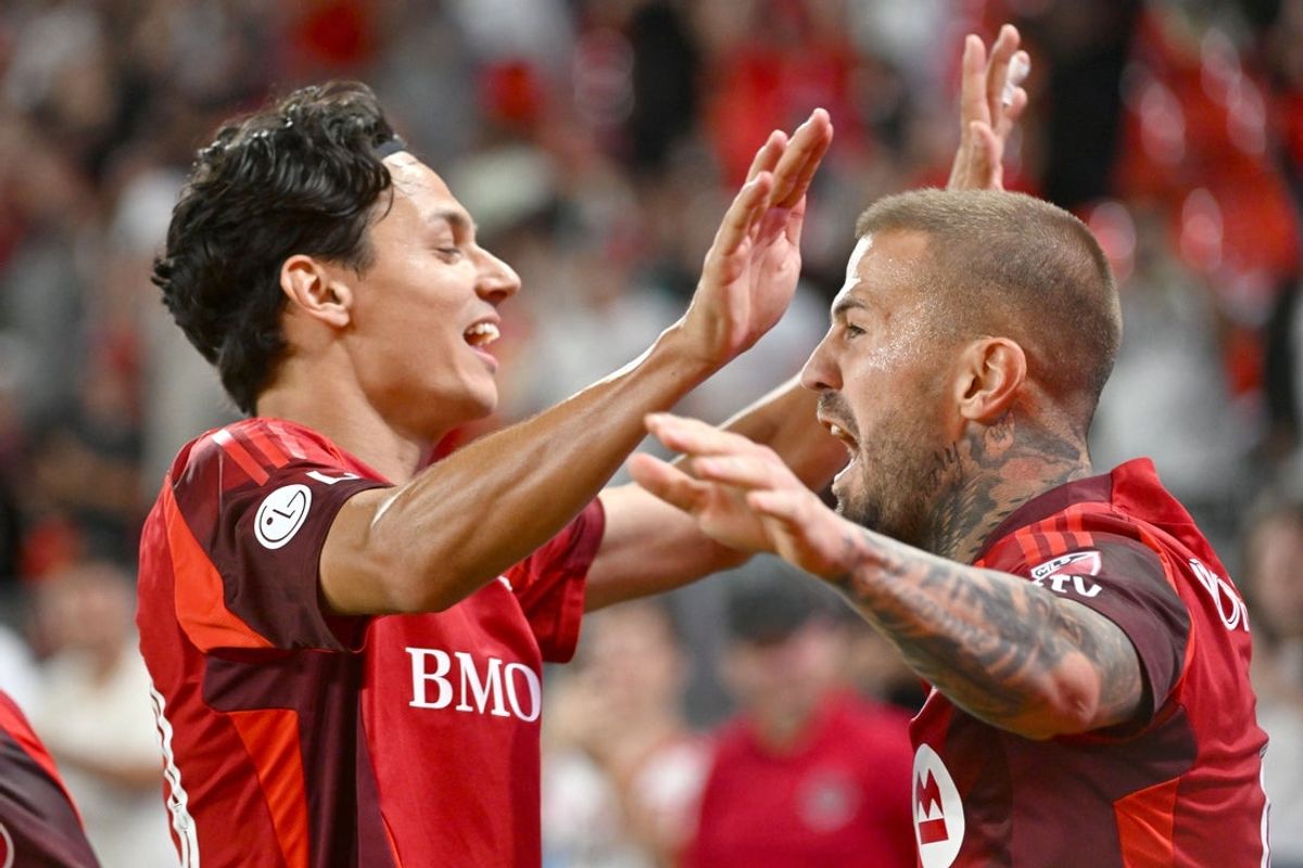 Aug 19, 2026; Toronto, Ontario, CAN; Toronto FC midfielder Niklas Dorsch (6, right) celebrates with forward Daniel Salloi (20) after scoring against Charlotte FC in the second half at BMO Field. Mandatory Credit: Dan Hamilton-Imagn Images