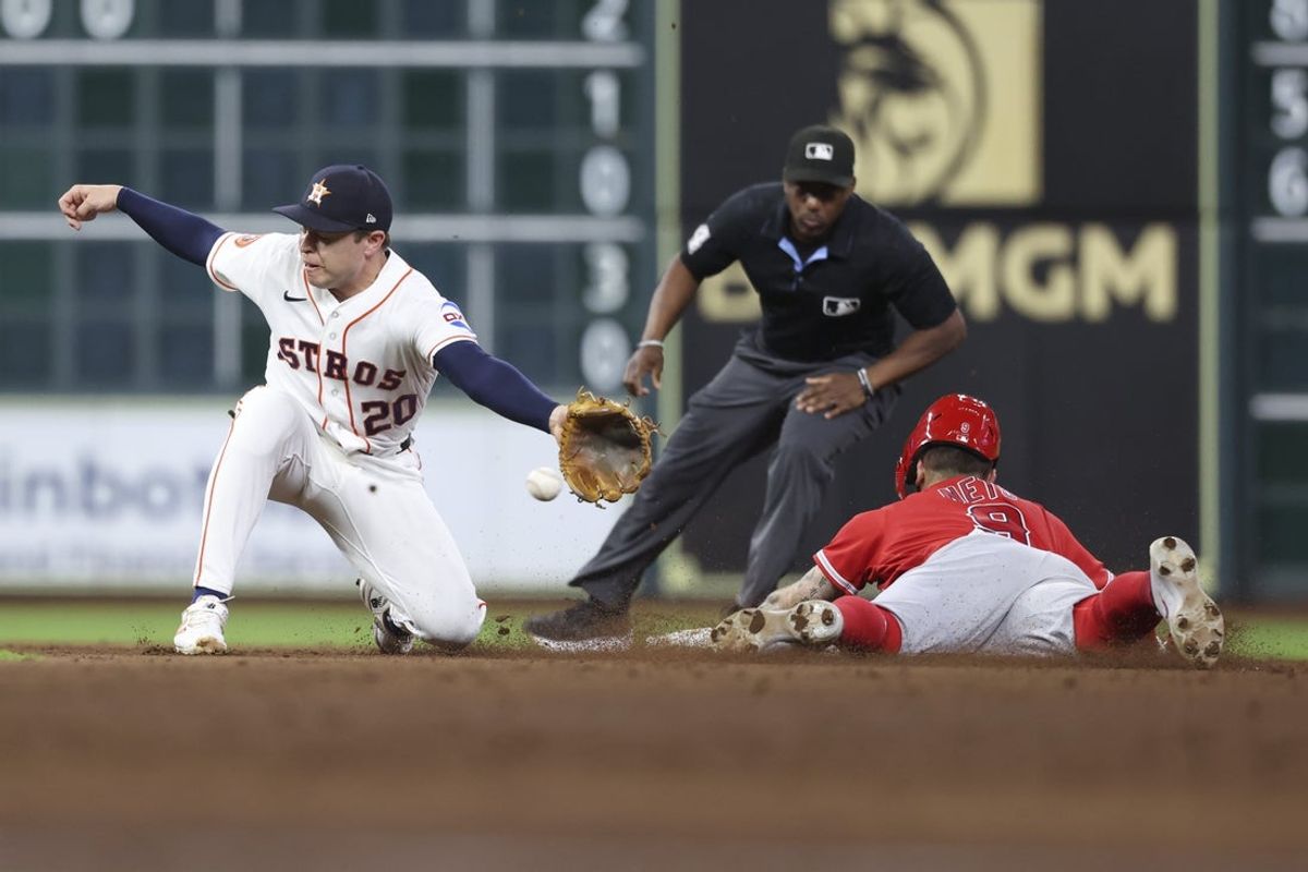 Aug 19, 2026; Houston, Texas, USA; Los Angeles Angels shortstop Zach Neto (9) is safe at second base with a stolen base as Houston Astros shortstop Nick Allen (20) attempts to field a throw during the fifth inning at Daikin Park. Mandatory Credit: Troy Taormina-Imagn Images