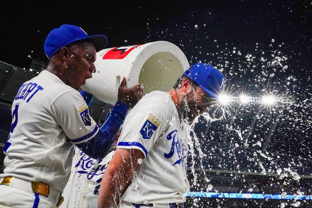 Aug 19, 2026; Kansas City, Missouri, USA; Kansas City Royals right fielder John Rave (16) is doused by left fielder Tyler Tolbert (2) and catcher Carter Jensen (22) after the win over the Athletics at Kauffman Stadium. Mandatory Credit: Denny Medley-Imagn Images