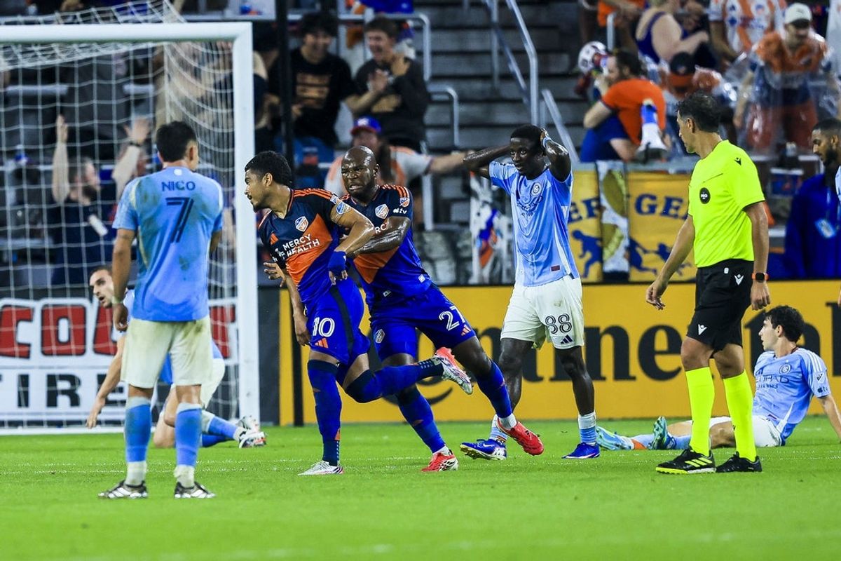 Aug 19, 2026; Cincinnati, Ohio, USA; FC Cincinnati forward Evander (10) reacts with midfielder Brian Anunga (27) after scoring a goal against New York City FC in the second half at TQL Stadium. Mandatory Credit: Katie Stratman-Imagn Images