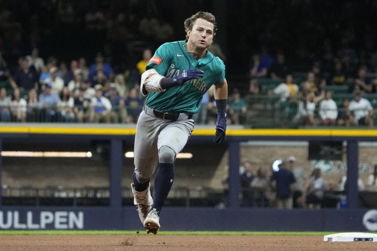 Aug 19, 2026; Milwaukee, Wisconsin, USA; Seattle Mariners second baseman Brock Rodden (90) runs after hitting a triple against the Milwaukee Brewers in the eighth inning at American Family Field. Mandatory Credit: Michael McLoone-Imagn Images