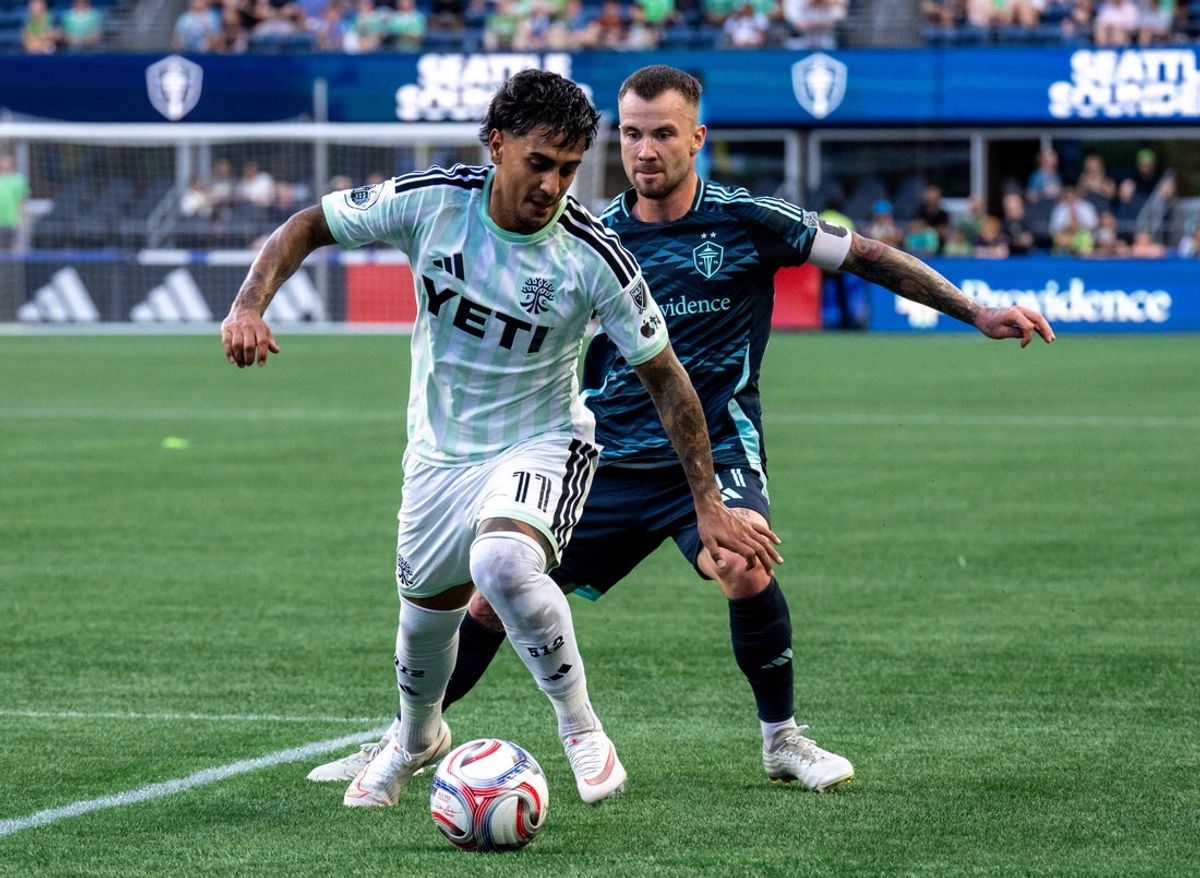 Aug 19, 2026; Seattle, Washington, USA;  Austin FC forward Facundo Torres (11), left, dribbles the ball against Seattle Sounders midfielder Albert Rusnak (11) during the first half at Lumen Field. Mandatory Credit: Stephen Brashear-Imagn Images