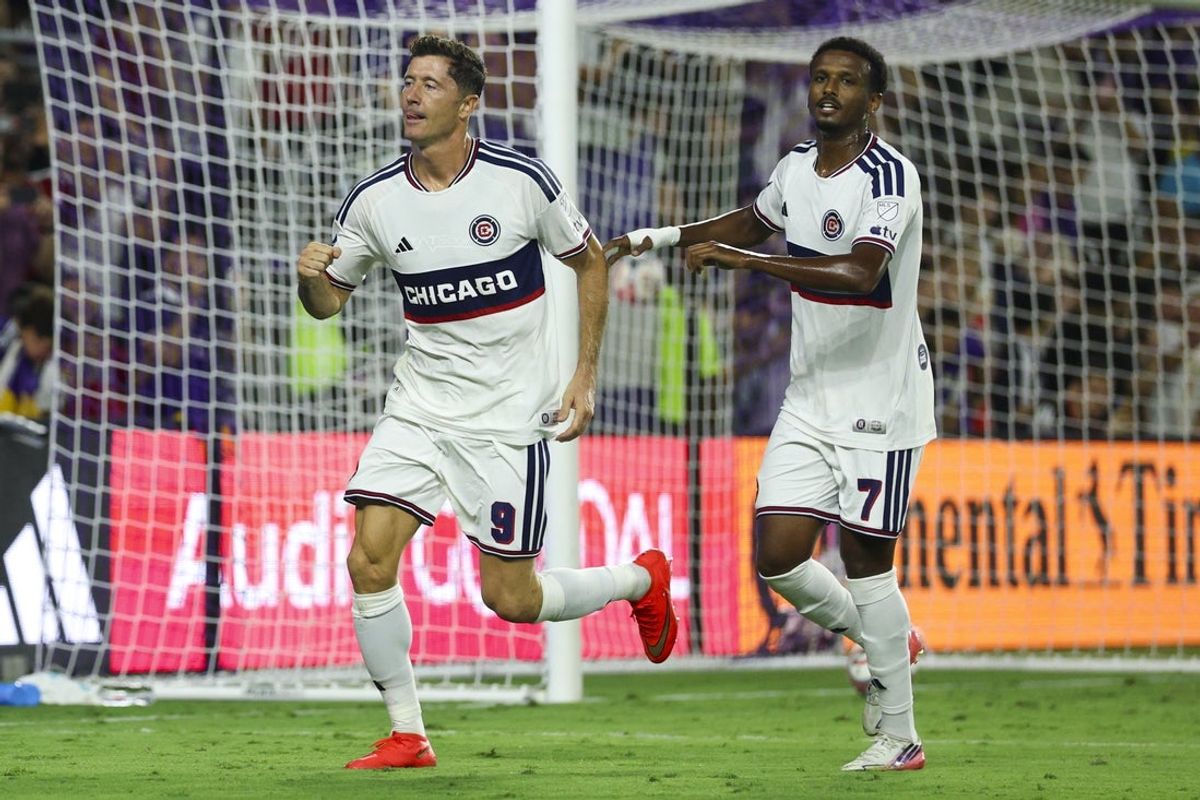 Aug 19, 2026; Orlando, Florida, USA; -Chicago Fire forward Robert Lewandowski (9) reacts with midfielder Maren Haile-Selassie (7) after scoring a goal on a penalty kick against Orlando City in the second half at Inter&Co Stadium. Mandatory Credit: Nathan Ray Seebeck-Imagn Images