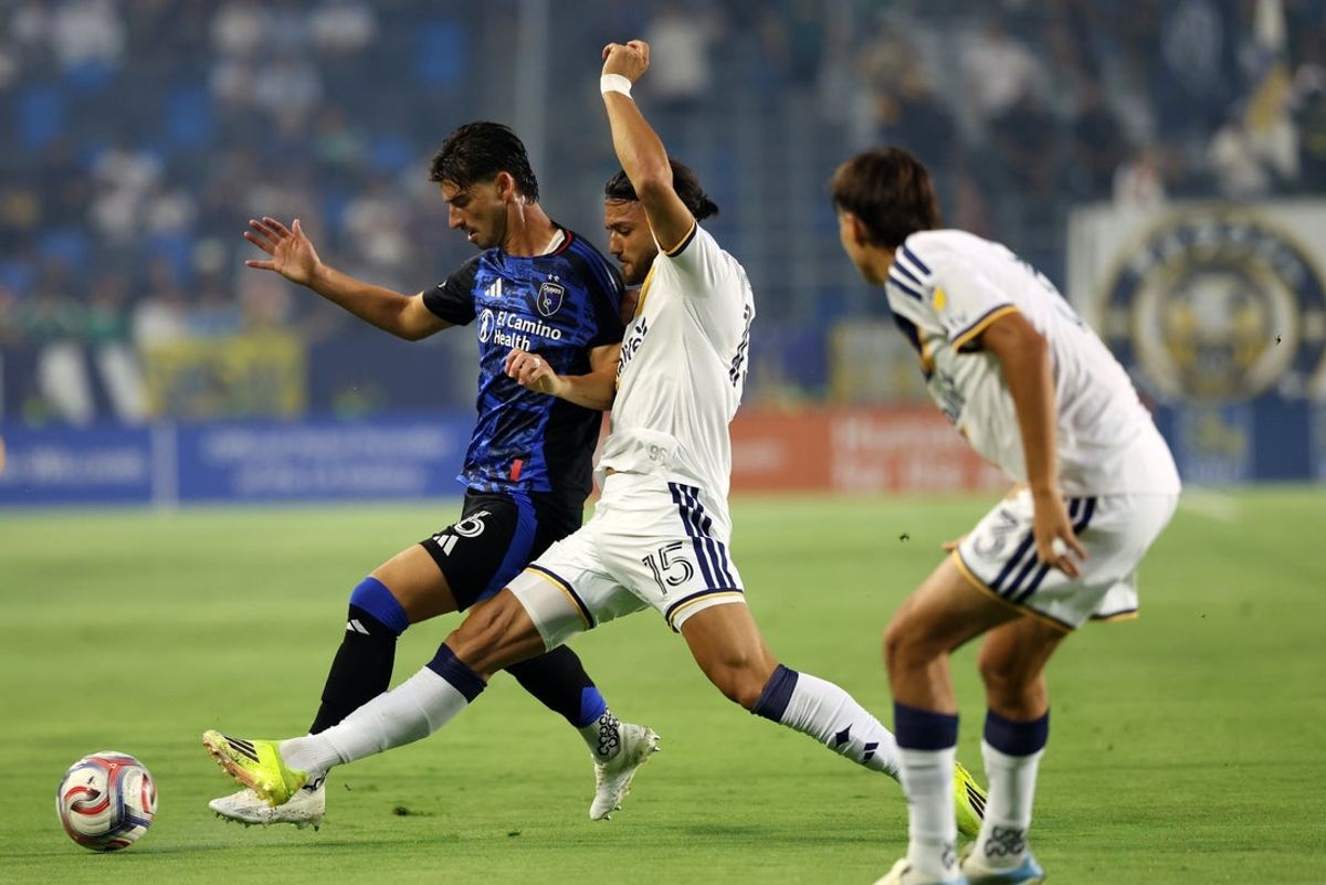 Aug 19, 2026; Carson, California, USA; San Jose Earthquakes midfielder Ian Harkes (6) and LA Galaxy midfielder Justin Haak (15) fight for the ball during the first half at Dignity Health Sports Park. Mandatory Credit: Kiyoshi Mio-Imagn Images