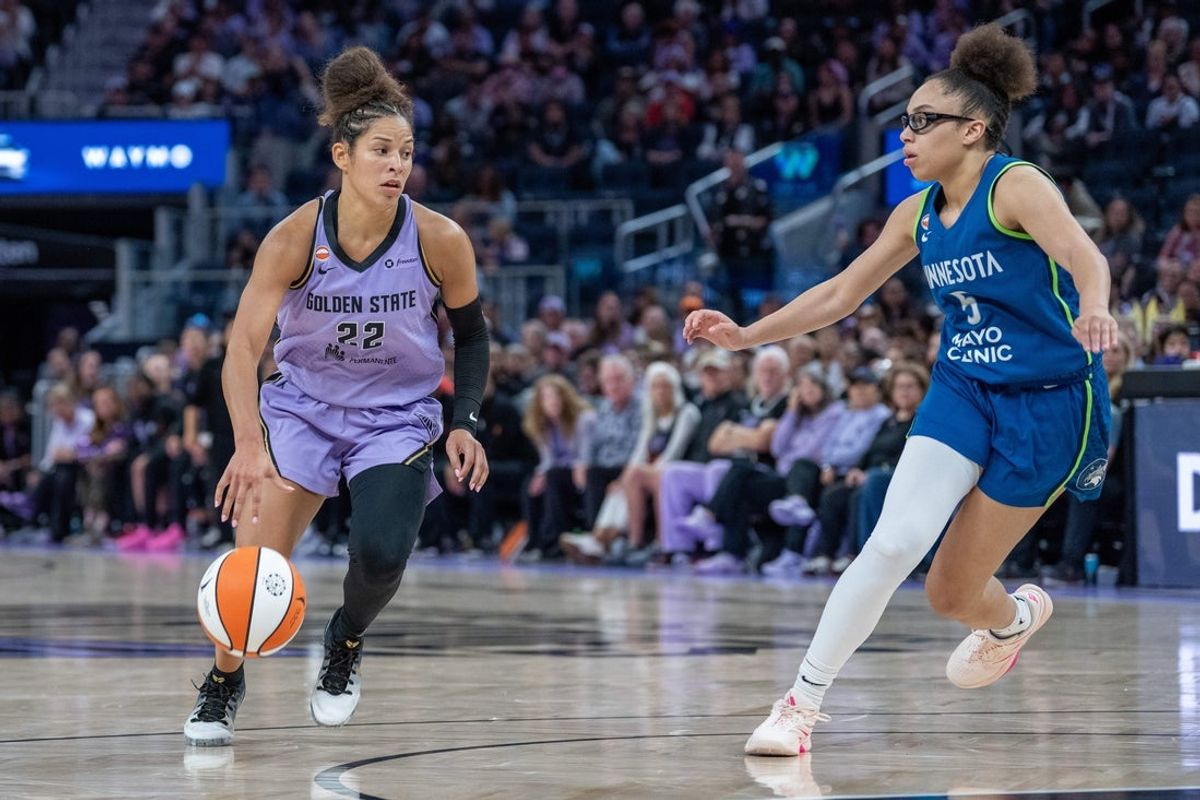 Aug 19, 2026; San Francisco, California, USA; Golden State Valkyries guard Veronica Burton (22) drives to the net against Minnesota Lynx guard Olivia Miles (5) during the fourth quarter at Chase Center. Mandatory Credit: Neville E. Guard-Imagn Images