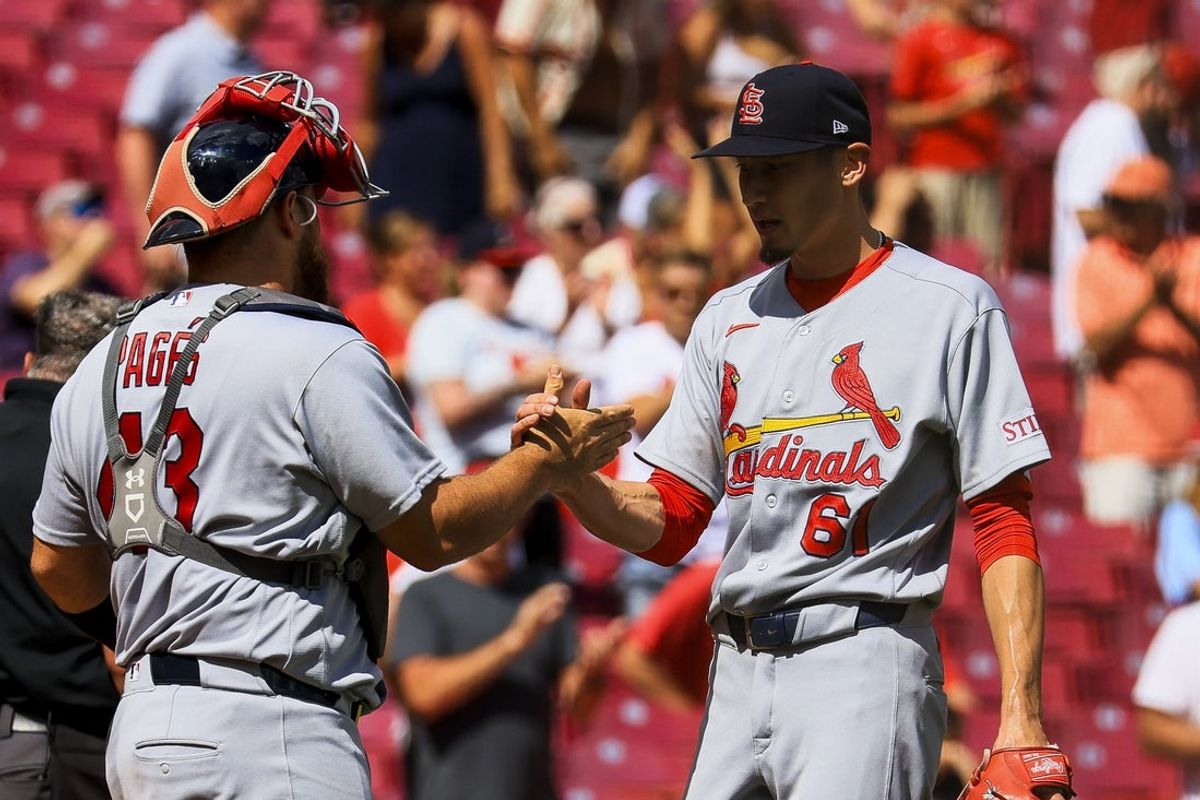 Aug 20, 2026; Cincinnati, Ohio, USA; St. Louis Cardinals relief pitcher Riley O'Brien (61) shakes hands with catcher Pedro Pages (43) after the victory over the Cincinnati Reds at Great American Ball Park. Mandatory Credit: Katie Stratman-Imagn Images
