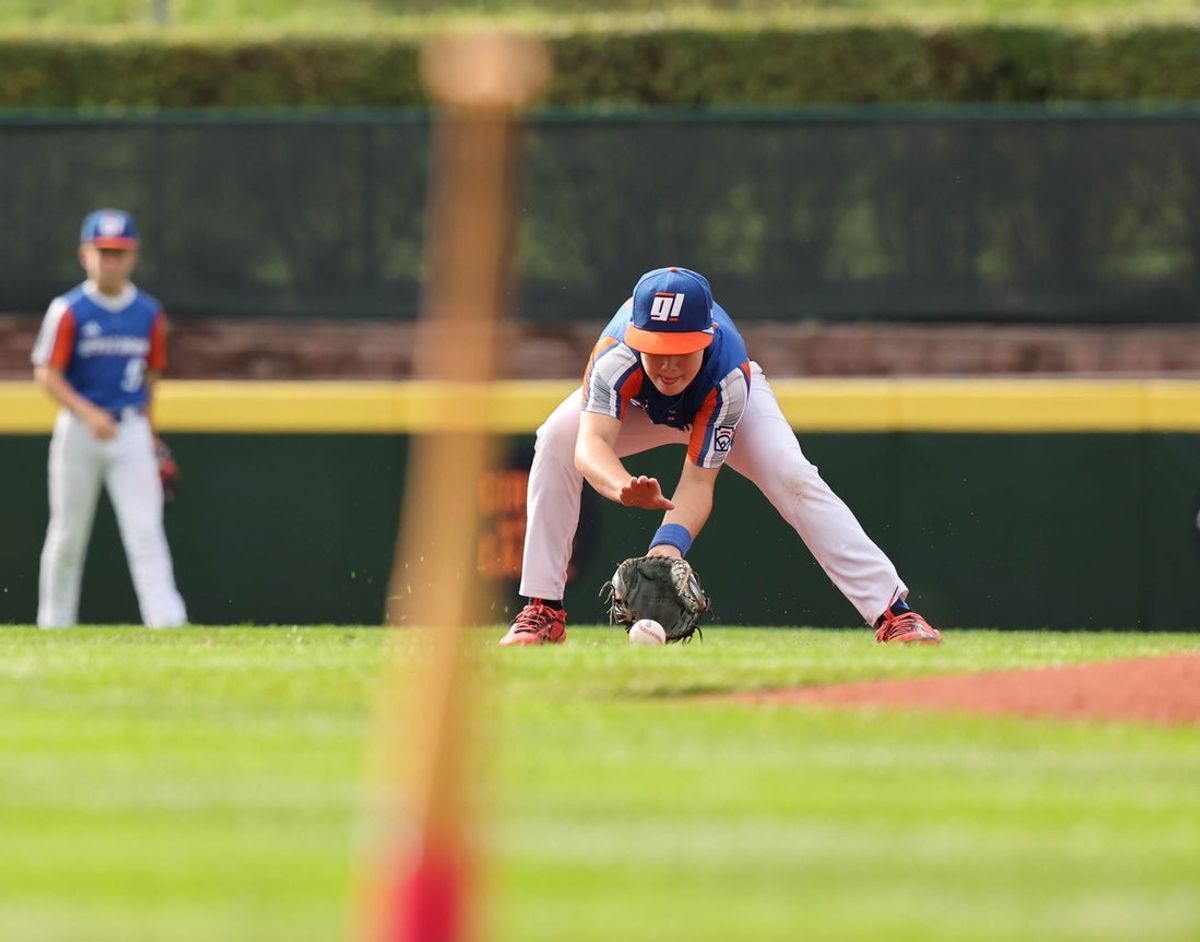 Shortstop Leo Feltner of Hamilton, Ohio, (Great Lakes Region) fields the ground ball and throws out the runner at first base against Henderson Nevada, (Mountain Region) at the Little League Baseball World Series at Howard J. Lamade Stadium in South Williamsport, Pennsylvania, on Friday, Aug. 21, 2026.