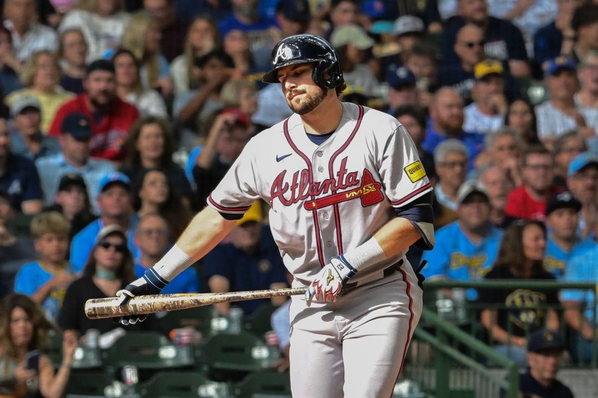 Aug 21, 2026; Milwaukee, Wisconsin, USA;  Atlanta Braves third baseman Austin Riley (27) reacts after striking out in the fifth inning against the Milwaukee Brewers at American Family Field.  Mandatory Credit: Benny Sieu-Imagn Images