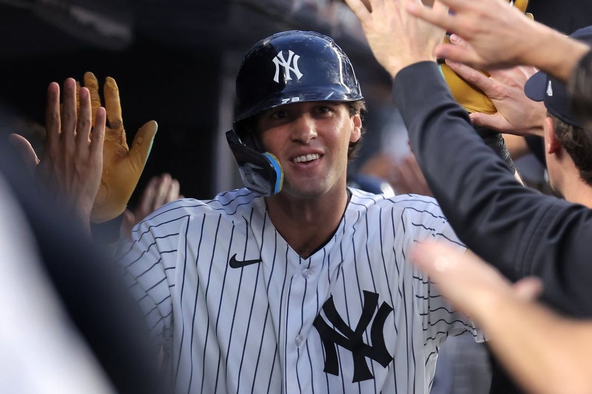 Aug 21, 2026; Bronx, New York, USA; New York Yankees right fielder Spencer Jones (78) celebrates his two run home run against the Toronto Blue Jays with teammates in the dugout during the second inning at Yankee Stadium. Mandatory Credit: Brad Penner-Imagn Images