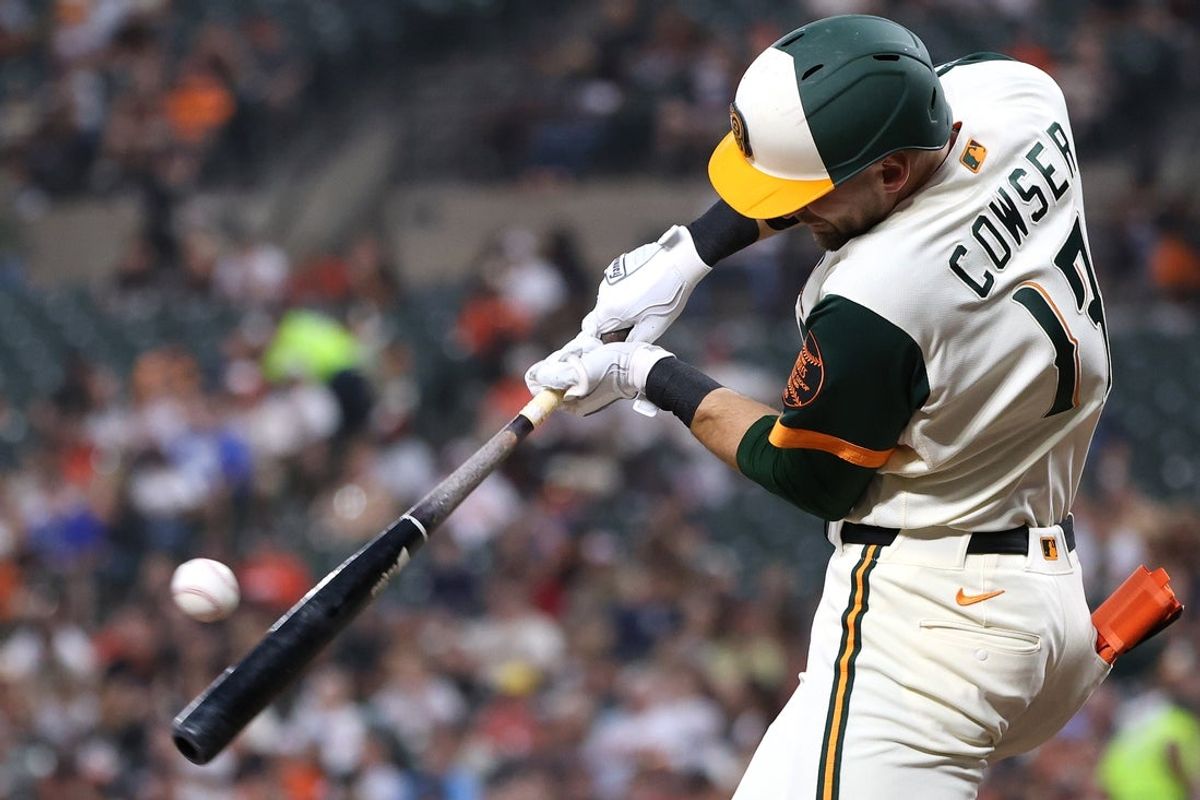 Aug 21, 2026; Baltimore, Maryland, USA;  Baltimore Orioles center fielder Colton Cowser (17) hits a single during the second inning against the Tampa Bay Rays at Oriole Park at Camden Yards.  Mandatory Credit: Daniel Kucin Jr.-Imagn Images