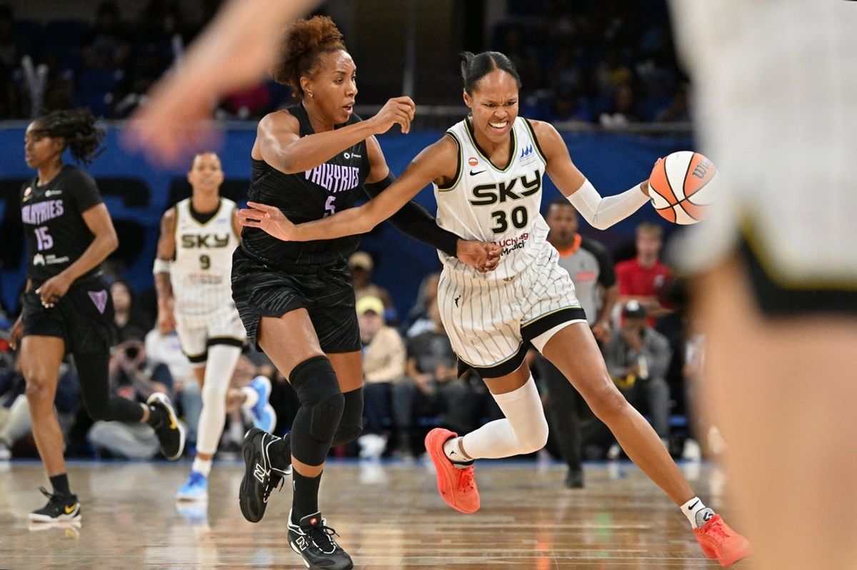 Aug 21, 2026; Chicago, Illinois, USA;  Chicago Sky forward-center Azura Stevens (30) drives the ball against Golden State Valkyries forward Kayla Thornton (5) during the first half at the Wintrust Arena.  Mandatory Credit: Patrick Gorski-Imagn Images