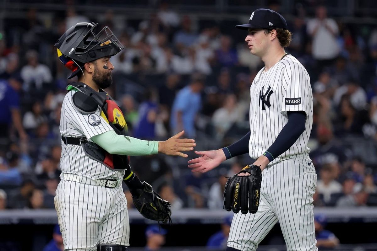 Aug 21, 2026; Bronx, New York, USA; New York Yankees catcher Ali Sanchez (39) shakes hands with starting pitcher Cam Schlittler (31) after the top of the sixth inning against the Toronto Blue Jays at Yankee Stadium. Mandatory Credit: Brad Penner-Imagn Images