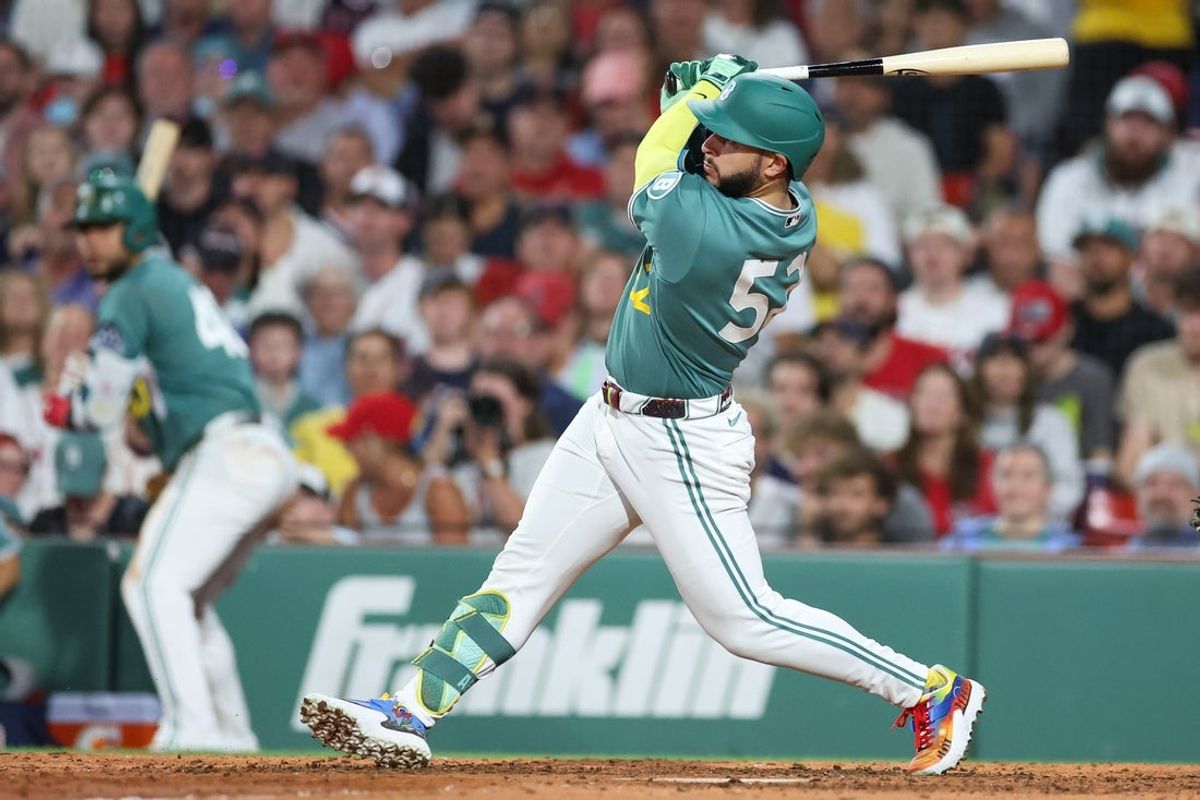 Aug 21, 2026; Boston, Massachusetts, USA; Boston Red Sox right fielder Wilyer Abreu (52) hits an RBI triple during the sixth inning against the San Francisco Giants at Fenway Park. Mandatory Credit: Paul Rutherford-Imagn Images