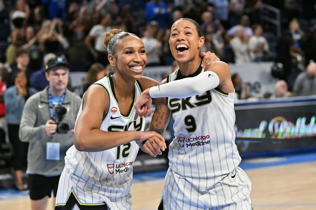 Aug 21, 2026; Chicago, Illinois, USA;  Chicago Sky guard Sydney Taylor (12) celebrates the game winning three point shot with guard Natasha Cloud (9) against the Golden State Valkyries after the game at the Wintrust Arena.  Mandatory Credit: Patrick Gorski-Imagn Images