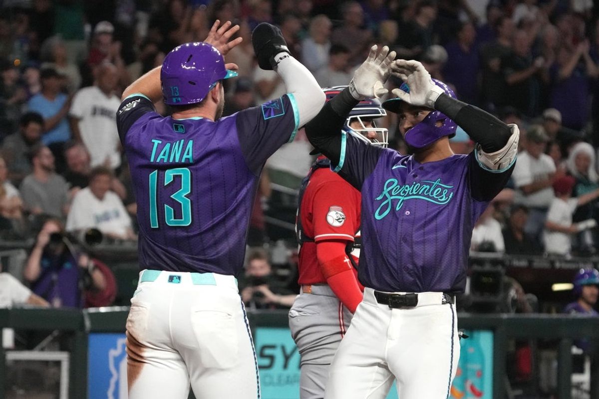 Aug 21, 2026; Phoenix, Arizona, USA;  Arizona Diamondbacks left fielder Jordan Lawlar (10) celebrates with first baseman Tim Tawa (13) after hitting a two-run home run against the Cincinnati Reds in the second inning at Chase Field.  Mandatory Credit: Rick Scuteri-Imagn Images