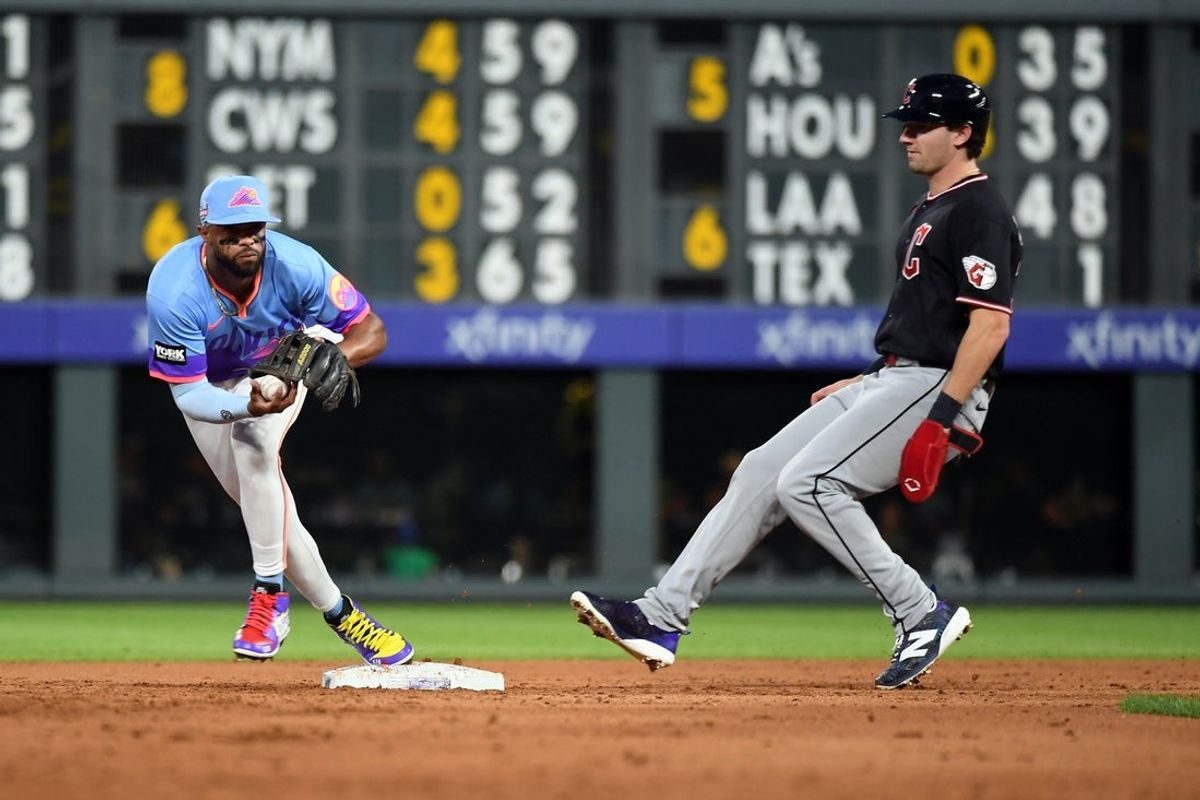 Aug 21, 2026; Denver, Colorado, USA; Colorado Rockies infielder Willi Castro (3) gets the force out at second base ahead Cleveland Guardians outfielder Chase DeLauter (24) in the fourth ibnning at Coors Field. Mandatory Credit: Christopher Hanewinckel-Imagn Images