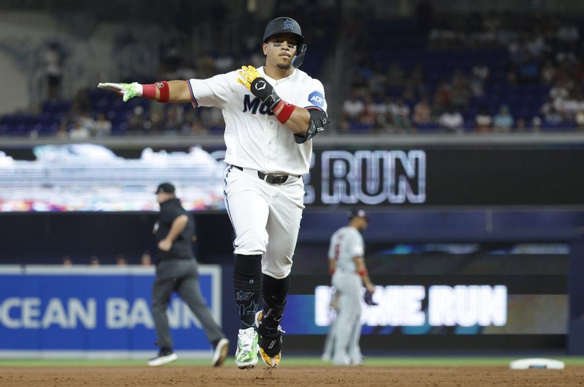 Aug 22, 2026; Miami, FL, USA;  Miami Marlins Heriberto Hernandez (13) reacts as he circles the bases following his home run against the Washington Nationals during the second inning at loanDepot Park.  Mandatory Credit: Rhona Wise-Imagn Images