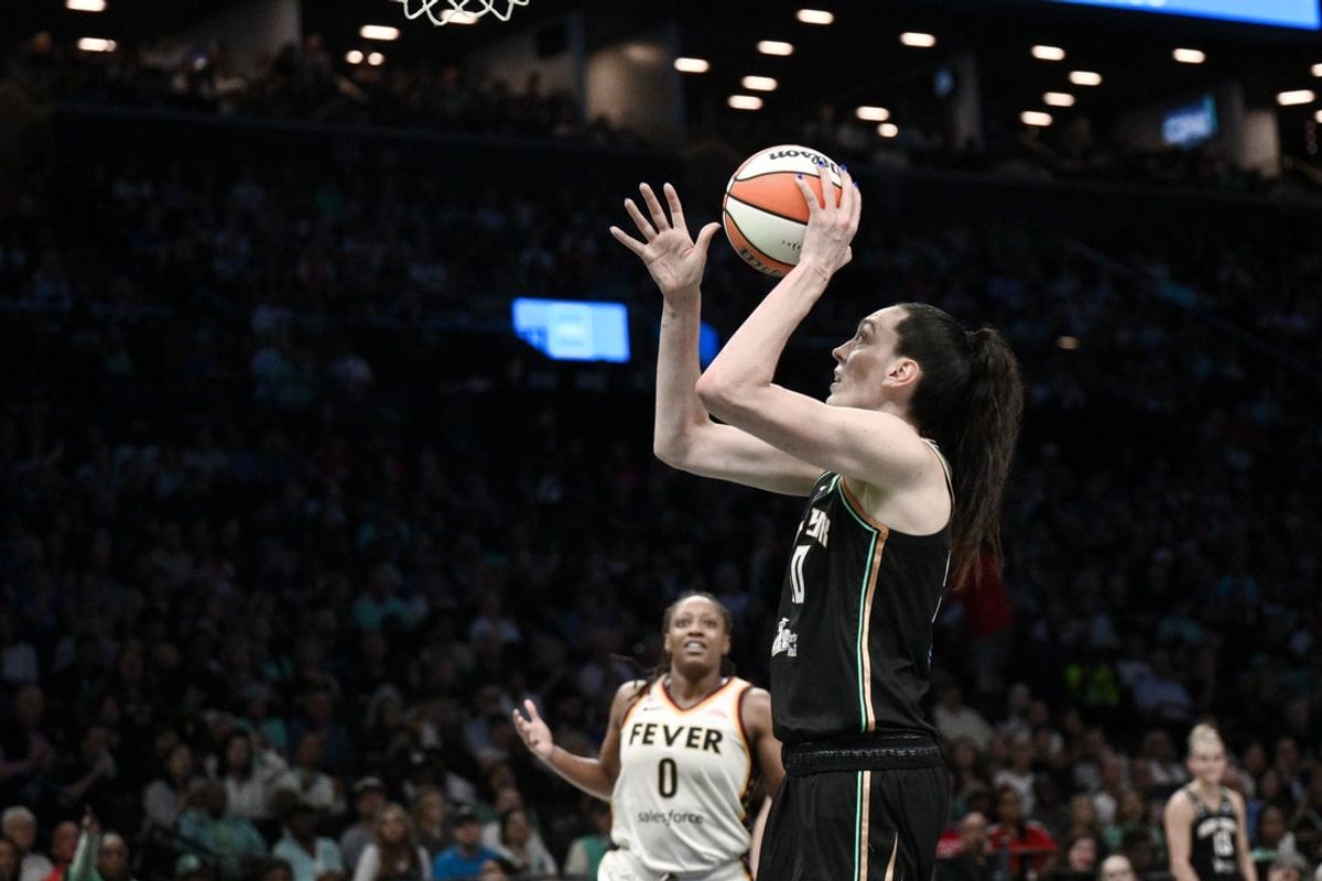 Aug 22, 2026; Brooklyn, New York, USA;  New York Liberty forward Breanna Stewart (30) shoots the ball while defended by Indiana Fever guard Kelsey Mitchell (0) during the first half at Barclays Center.  Mandatory Credit: John Jones-Imagn Images