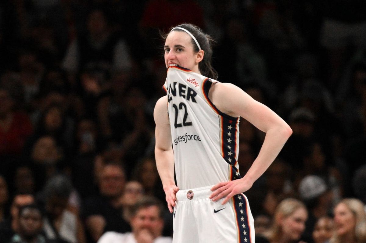 Aug 22, 2026; Brooklyn, New York, USA;  Indiana Fever guard Caitlin Clark (22) reacts during the second half against the New York Liberty at Barclays Center.  Mandatory Credit: John Jones-Imagn Images