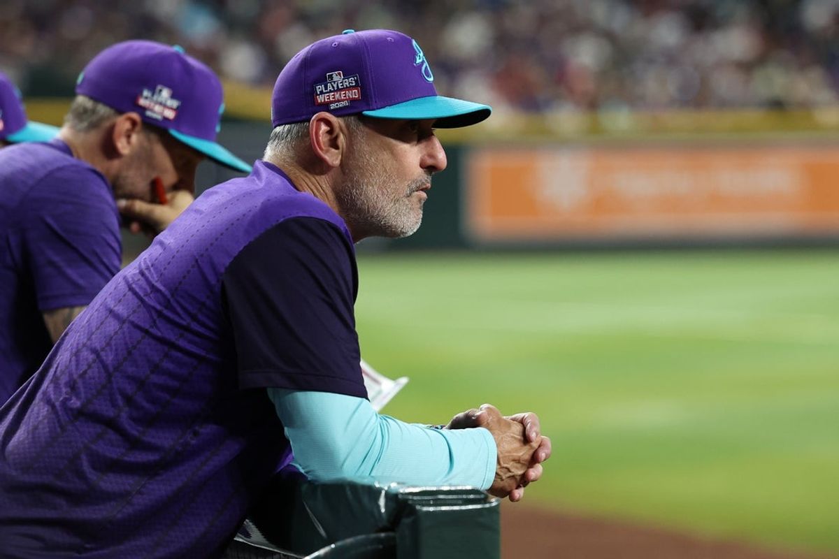 Aug 22, 2026; Phoenix, Arizona, USA;  Arizona Diamondbacks manager Torey Lovullo (17) looks out to the field against the Cincinnati Reds in the second inning at Chase Field.  Mandatory Credit: Anna Carrington-Imagn Images