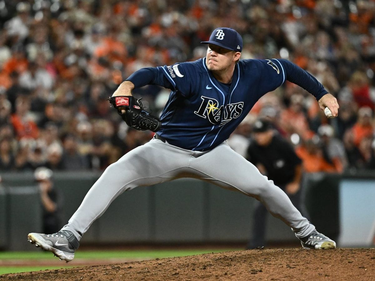 Aug 22, 2026; Baltimore, Maryland, USA;  Tampa Bay Rays pitcher Garrett Cleavinger (60) delivers a pitch during the eighth inning against the Baltimore Orioles at Oriole Park at Camden Yards.  Mandatory Credit: James A. Pittman-Imagn Images