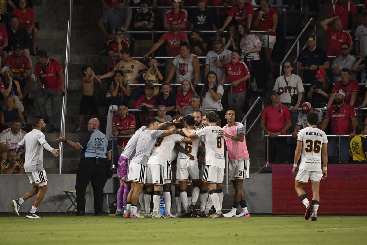 Aug 22, 2026; St. Louis, Missouri, USA;  Houston Dynamo FC forward Ibrahim Aliyu (24) is congratulated after scoring against St. Louis CITY SC in the second half at Energizer Park.  Mandatory Credit: Joe Puetz-Imagn Images