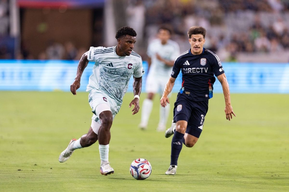 Aug 22, 2026; San Diego, California, USA;  Colorado Rapids forward Dante Sealy (7) moves the ball against San Diego FC midfielder Gabriel Pirani (12) during the first half at Snapdragon Stadium.  Mandatory Credit: Chadd Cady-Imagn Images