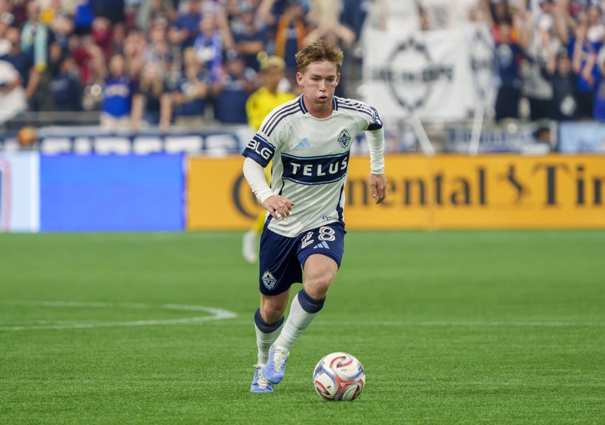 Aug 22, 2026; Vancouver, British Columbia, CAN;  Vancouver Whitecaps FC defender Tate Johnson (28) plays the ball against FC Dallas in the second half at BC Place.  Mandatory Credit: Christopher Morris-Imagn Images