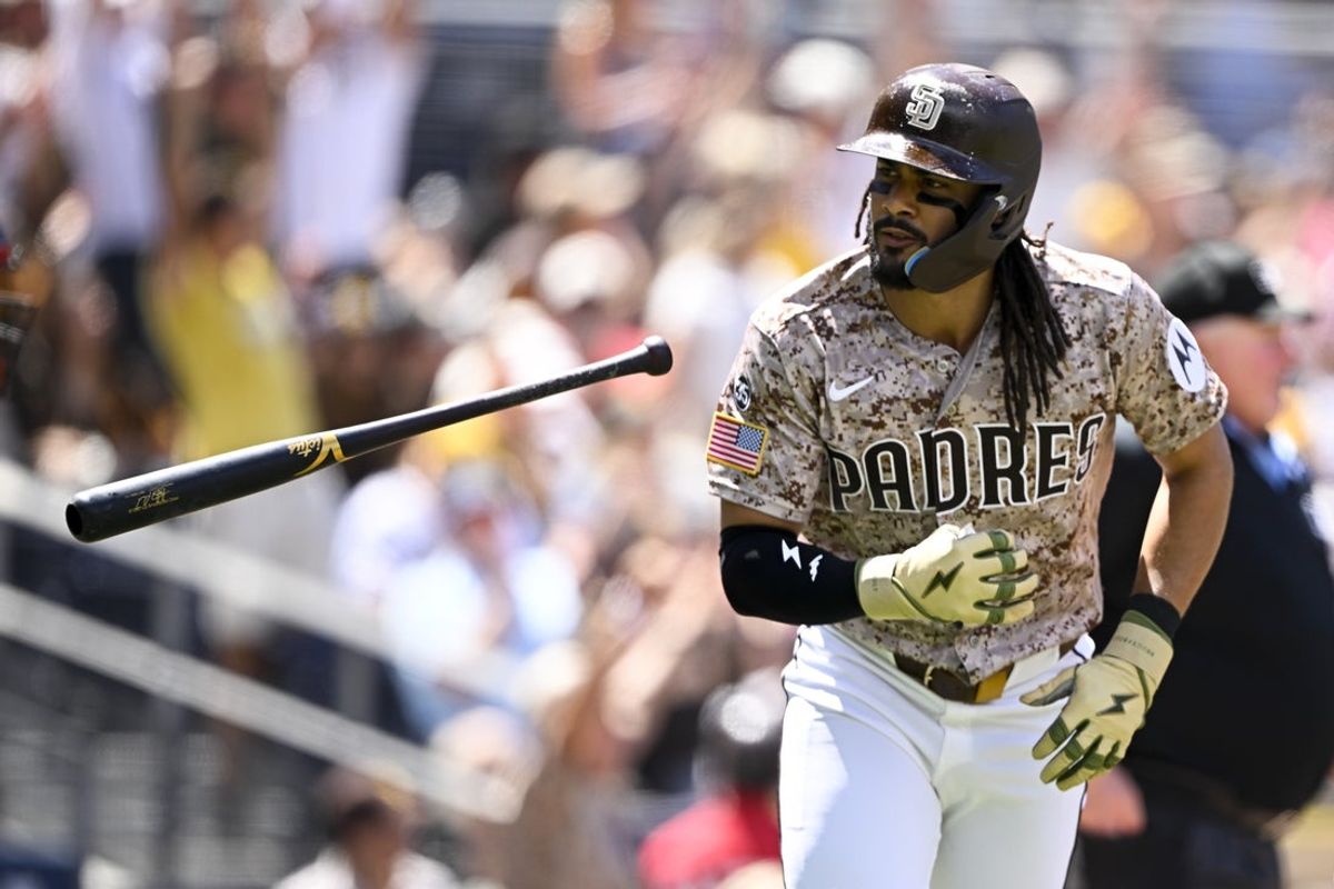 Aug 23, 2026; San Diego, California, USA;  San Diego Padres right fielder Fernando Tatis Jr. (23) hits a solo home run during the third inning against the Minnesota Twins at Petco Park.  Mandatory Credit: Denis Poroy-Imagn Images