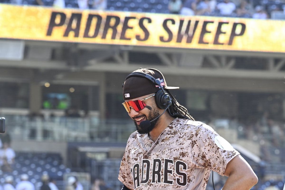 Aug 23, 2026; San Diego, California, USA;  San Diego Padres right fielder Fernando Tatis Jr. (23) does an interview after the Padres beat the Minnesota Twins at Petco Park.  Mandatory Credit: Denis Poroy-Imagn Images