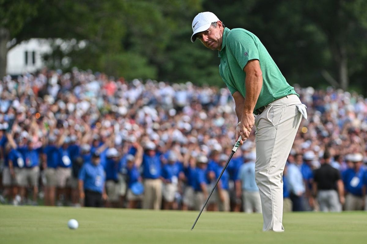 Aug 23, 2026; Saint Louis, Missouri, USA; Rory McIlroy putts on the eighteenth green during the final round of the BMW Championship golf tournament. Mandatory Credit: Jeff Curry-Imagn Images