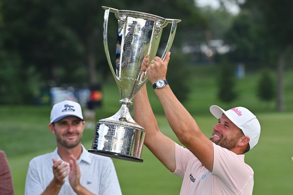 Aug 23, 2026; Saint Louis, Missouri, USA; Wyndham Clark holds up his trophy after winning the BMW Championship golf tournament. Mandatory Credit: Jeff Curry-Imagn Images