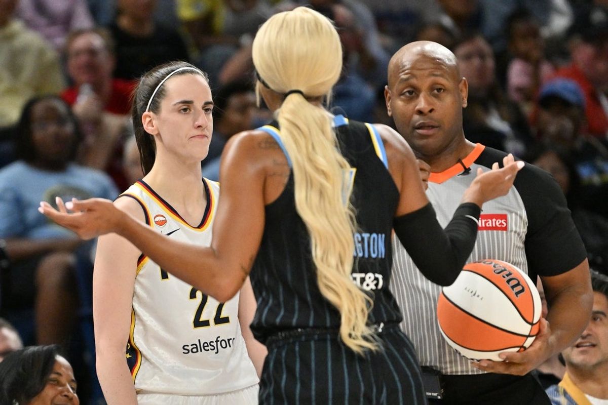 Aug 23, 2026; Chicago, Illinois, USA;  Indiana Fever guard Caitlin Clark (22) looks to pass the ball in bounds against Chicago Sky guard-forward DiJonai Carrington (7) during the first half at Wintrust Arena.  Mandatory Credit: Patrick Gorski-Imagn Images