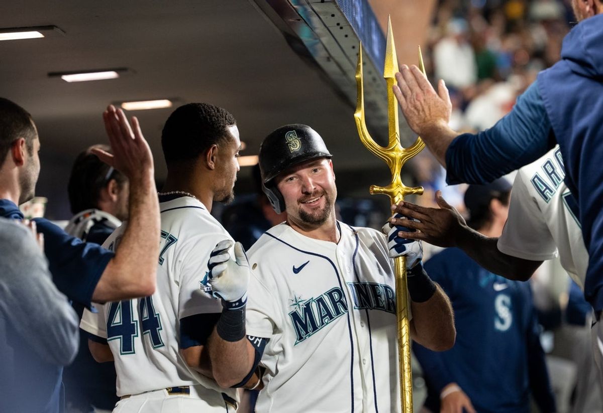 Aug 24, 2026; Seattle, Washington, USA;  Seattle Mariners catcher Cal Raleigh (29) celebrates in the dugout after hitting a solo home run during the fifth inning against the Philadelphia Phillies at T-Mobile Park. Mandatory Credit: Stephen Brashear-Imagn Images
