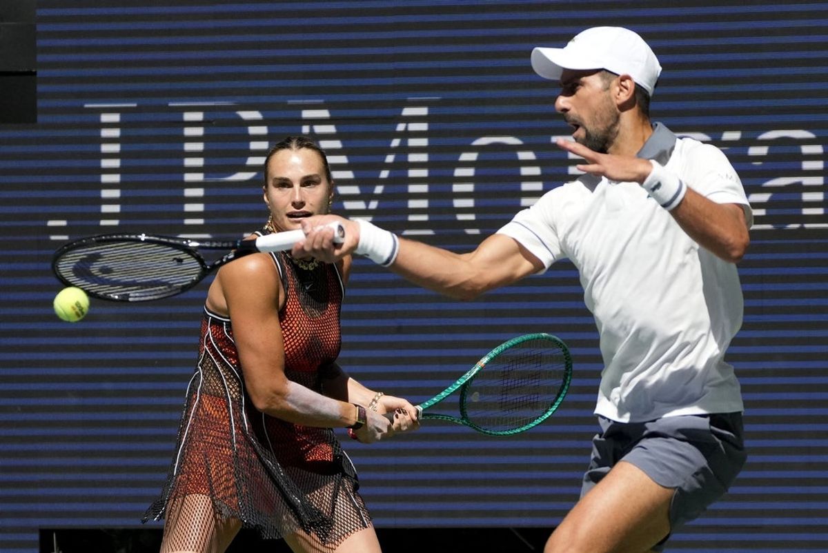August 25, 2026; New York, United States;  Belarus' Aryna Sabalenka and Serbia's Novak Djokovic in action during their mixed doubles round of 16 match against Britain's Henry Patten and Czech Republic's Katerina Siniakova.  Mandatory Credit: Eduardo Munoz-Reuters via Imagn Images