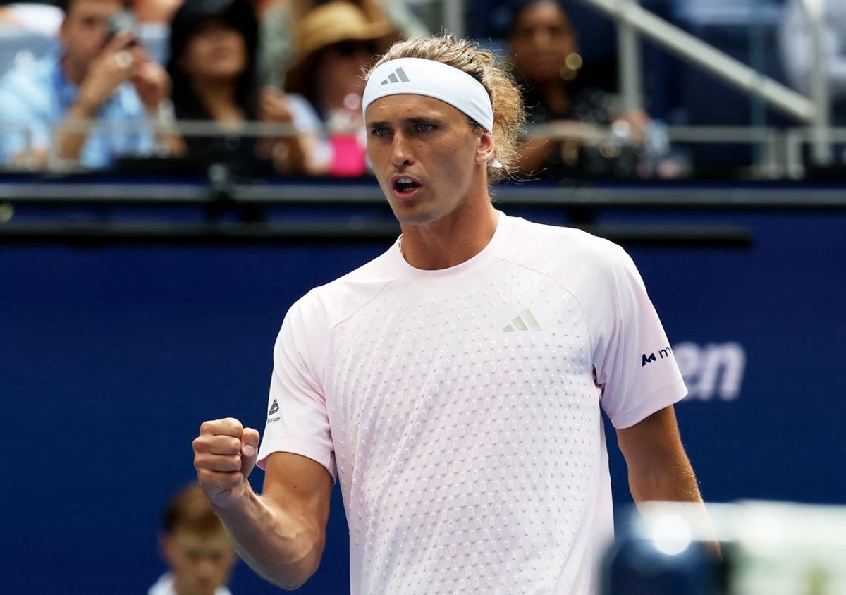 August 25, 2026; New York, United States;  Germany's Alexander Zverev in action during his mixed doubles round of 16 match with Taylor Townsend of the U.S. against Italy's Flavio Cobolli and Switzerland's Belinda Bencic.  Mandatory Credit: Mike Frey-Imagn Images