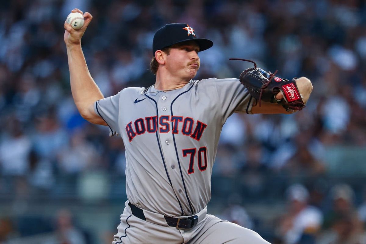 Aug 25, 2026; Bronx, New York, USA; Houston Astros pitcher Ethan Pecko (70) delivers a pitch during the first inning against the New York Yankees at Yankee Stadium. Mandatory Credit: Vincent Carchietta-Imagn Images