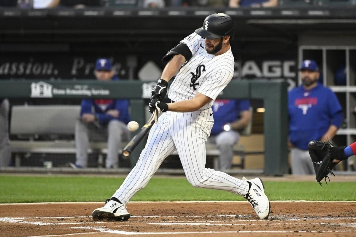 Aug 25, 2026; Chicago, Illinois, USA;  Chicago White Sox center fielder Tristan Peters (29) hits a two-RBI double during the first inning against the Texas Rangers at Rate Field.  Mandatory Credit: Matt Marton-Imagn Images
