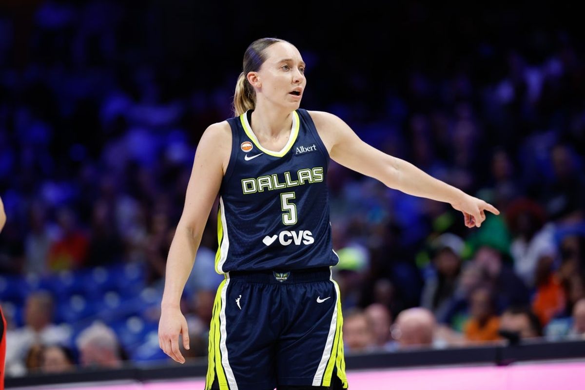 Aug 25, 2026; Arlington, Texas, USA;  Dallas Wings guard Paige Bueckers (5) gestures during the first half against the Portland Fire at College Park Center.  Mandatory Credit: Chris Jones-Imagn Images