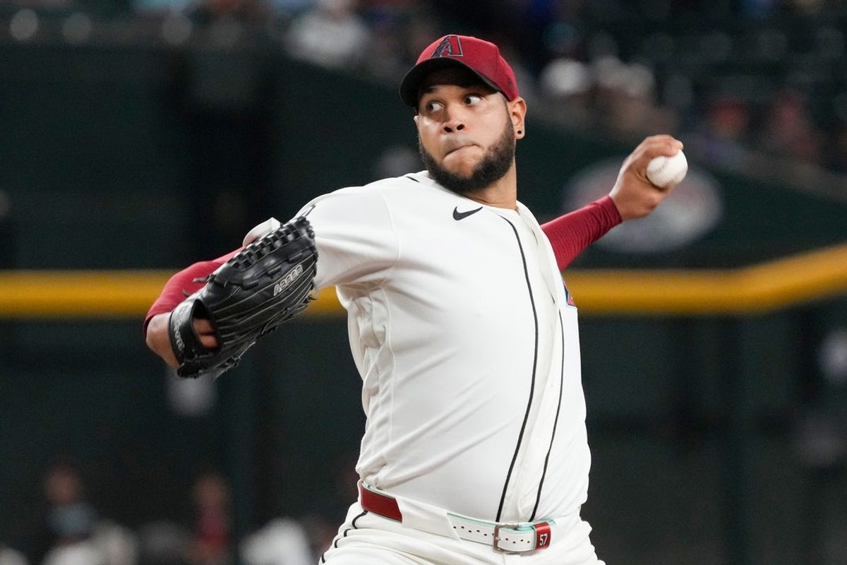 Aug 26, 2026; Phoenix, Arizona, USA;  Arizona Diamondbacks pitcher Eduardo Rodriguez (57) throws against the Chicago Cubs in the first inning at Chase Field.  Mandatory Credit: Rick Scuteri-Imagn Images