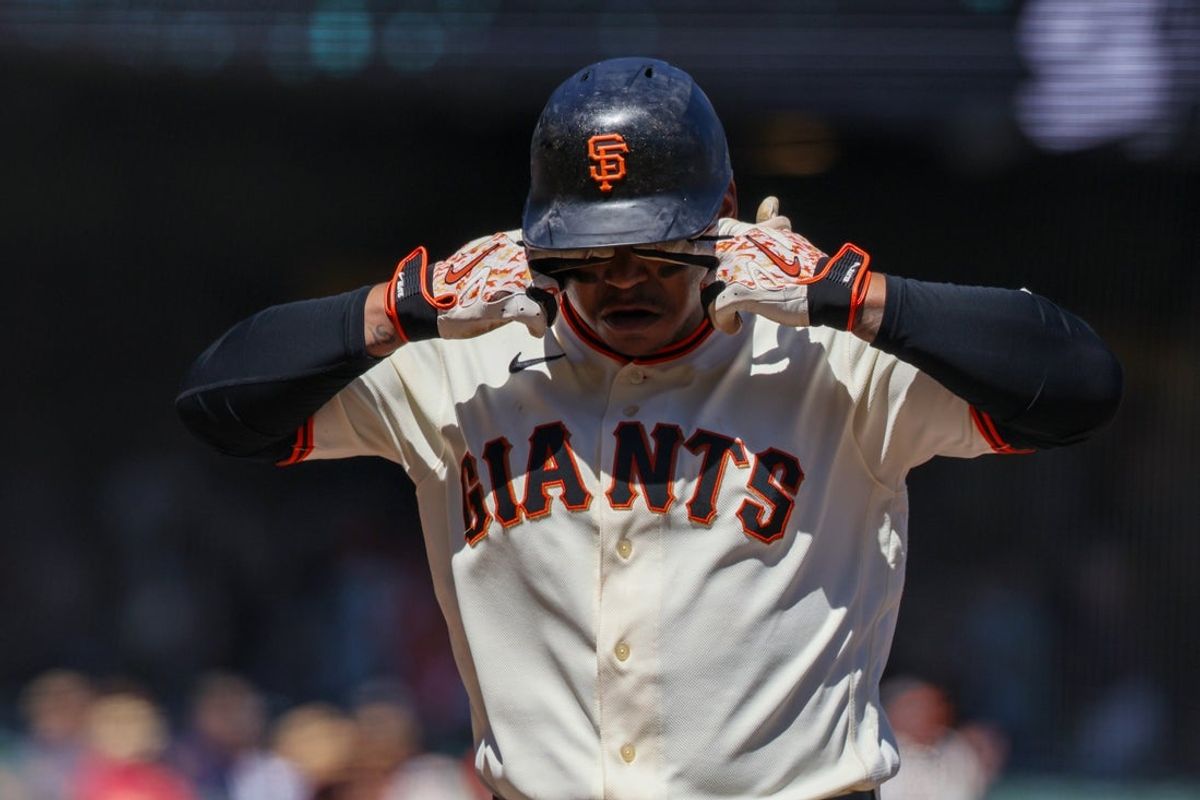 Aug 26, 2026; San Francisco, California, USA;  San Francisco Giants first baseman Rafael Devers (16) celebrates at home plate after hitting a two run home run during the fifth inning against the Cincinnati Reds at Oracle Park.  Mandatory Credit: Sergio Estrada-Imagn Images