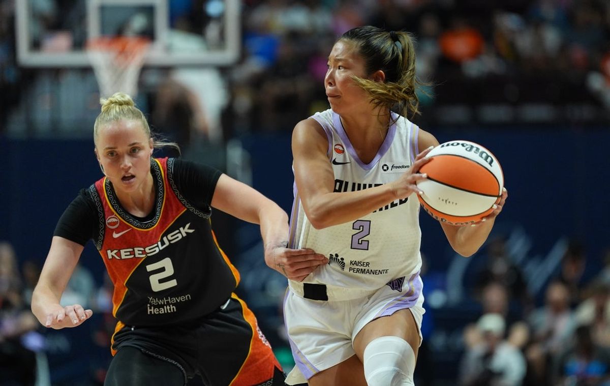 Aug 26, 2026; Uncasville, Connecticut, USA; Golden State Valkyries guard Kaitlyn Chen (2) drives the ball against Connecticut Sun guard Hailey van Lith (2) in the first half at Mohegan Sun Arena. Mandatory Credit: David Butler II-Imagn Images