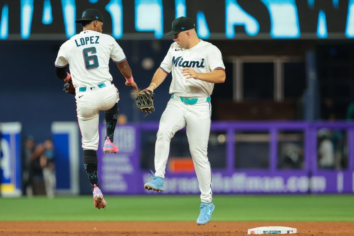 Aug 26, 2026; Miami, Florida, USA; Miami Marlins center fielder Jakob Marsee (87) celebrates with shortstop Otto Lopez (6) after the game against the Boston Red Sox at loanDepot Park. Mandatory Credit: Sam Navarro-Imagn Images