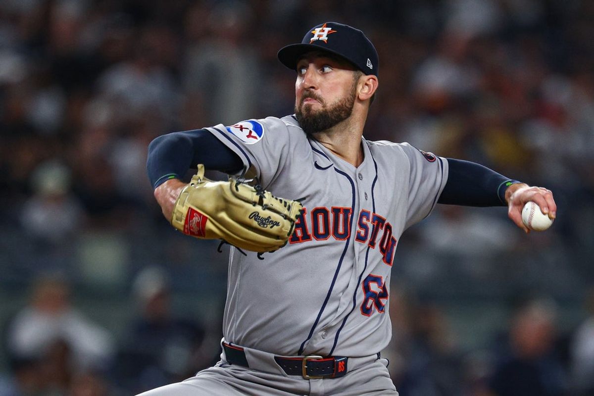Aug 26, 2026; Bronx, New York, USA; Houston Astros pitcher Bennett Sousa (62) delivers a pitch during the seventh inning against the New York Yankees at Yankee Stadium. Mandatory Credit: Vincent Carchietta-Imagn Images